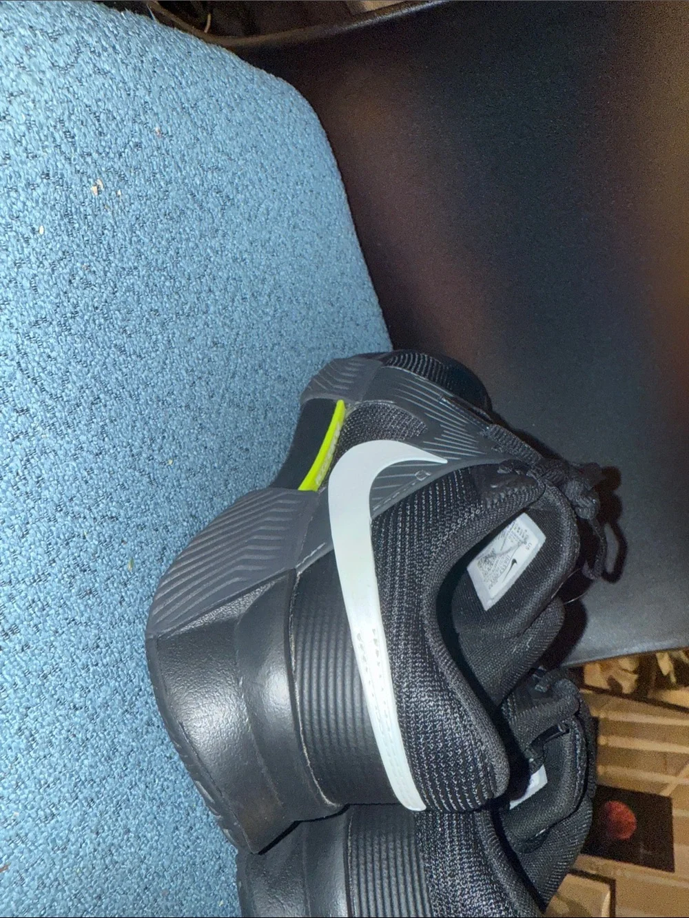 Nike Kids Black Sneakers with White Swoosh and Neon Yellow Accent